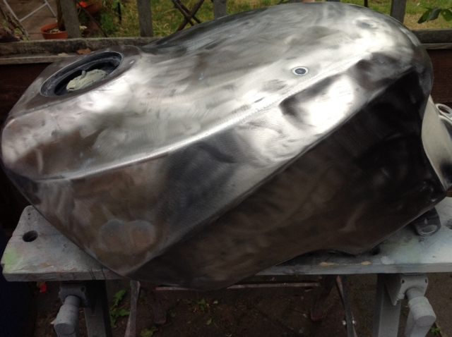 the gpz 600 r fuel tank stripped to bare metal ready for filling and painting
